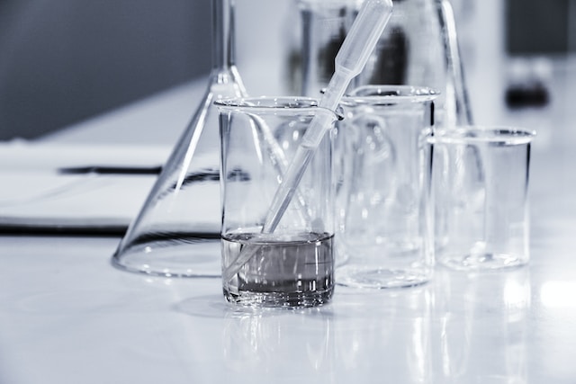 Empty beakers on a lab table.